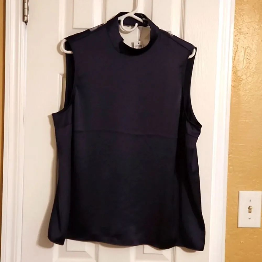 Black sleeveless blouse with V cutout in back by Express